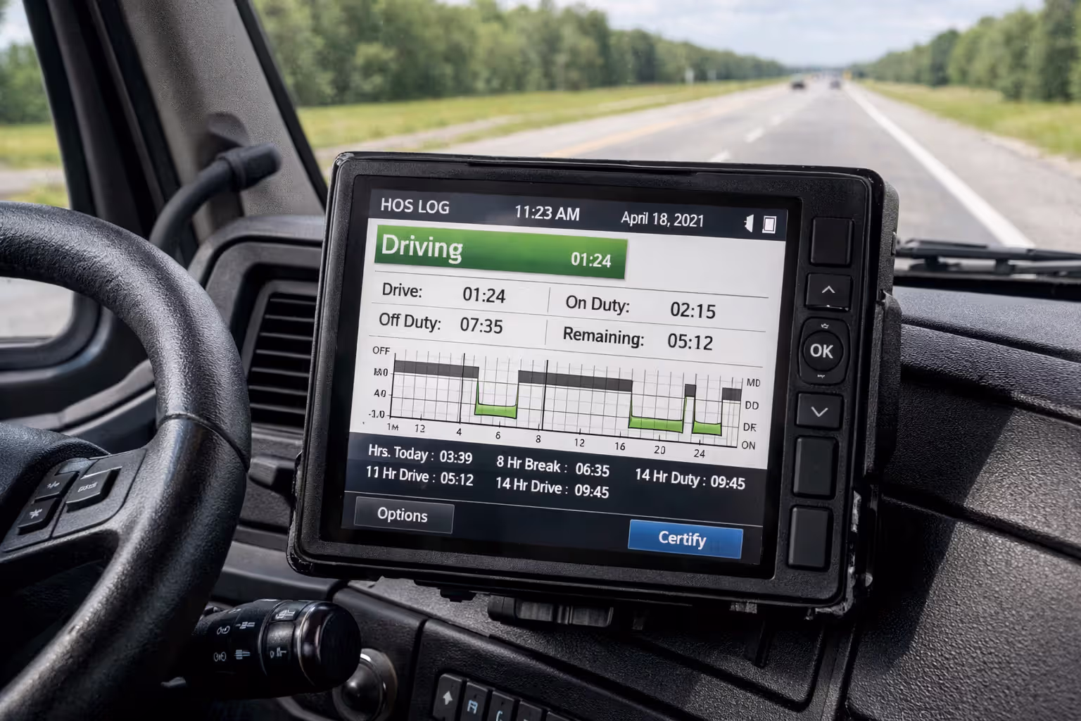 Close-up of electronic logging device screen inside truck cab showing driver hours-of-service digital log